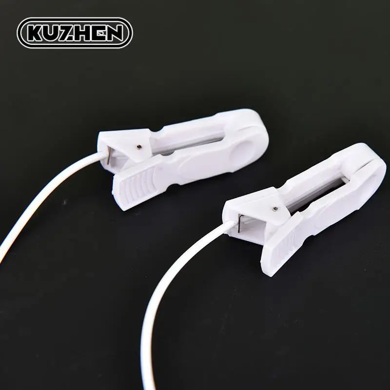 Ear Clip TENS Electrodes – 2mm Ear Pain Relief Clip Leads - in use