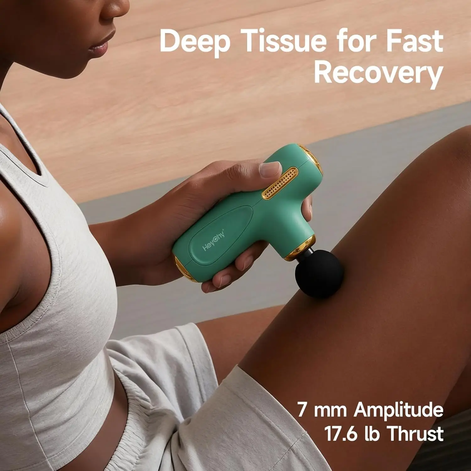 Mini Massage Gun – Portable Deep Tissue Percussion Massager with 4 Heads - in use
